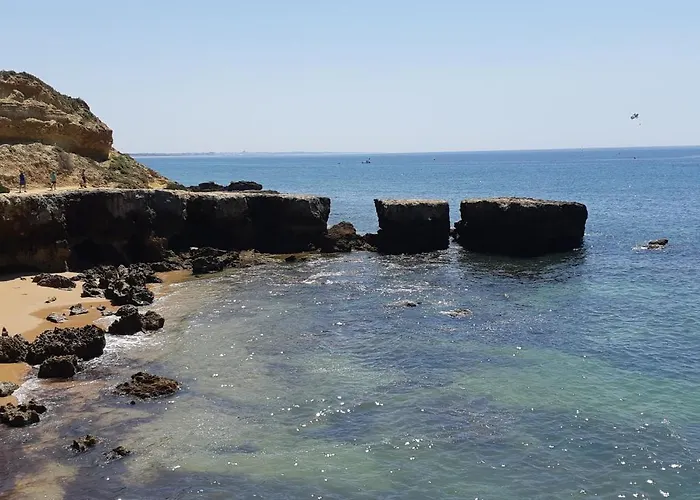 Апартаменти Jeannie's Oura Estrela